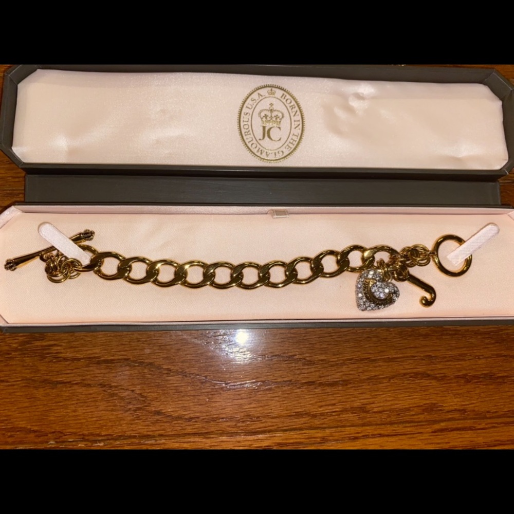 New! Never been worn! Juicy Couture Gold Charm Bracelet with diamond heart charm
